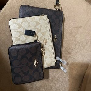 3 Coach Wristlets